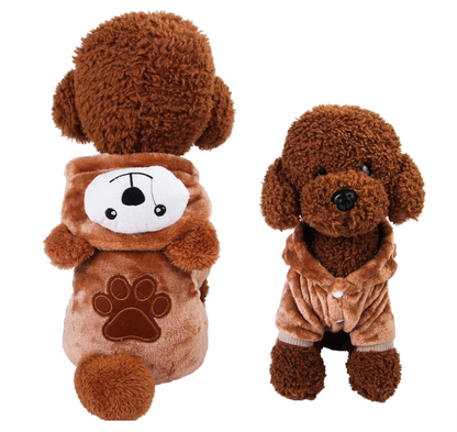 Two brown plush toys resembling dogs on a white background