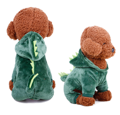 Dog toy with a green dinosaur costume on a white background