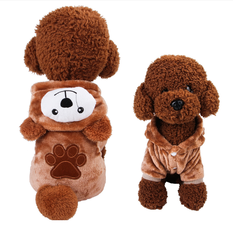Two brown plush toys resembling dogs on a white background