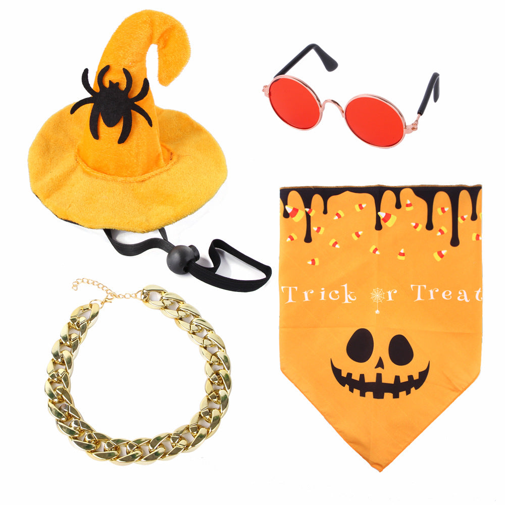 Halloween-themed accessories including a yellow witch hat with a spider, red sunglasses, gold necklace, and orange bandana with a pumpkin design.